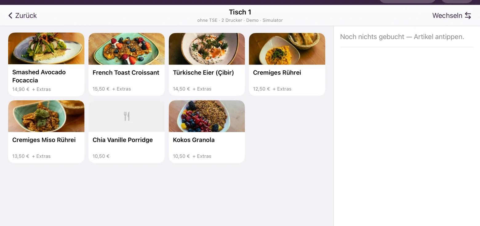 Keksu Kasse mit Gerichten und Warenkorb auf einem Tablet